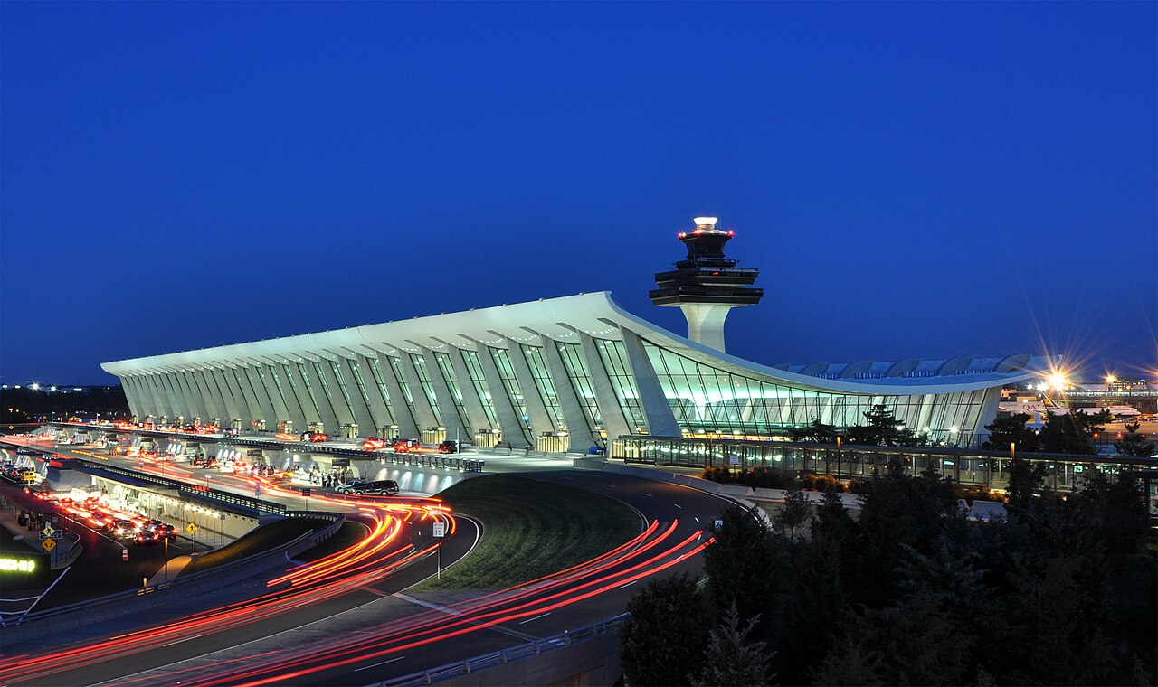 United Polaris Lounge IAD — photo illustration accompanying Lounges Desk brief from Business Travel Today. United's 21,000-square-foot Polaris Lounge at Washington Dulles opened in October 2021 on Concourse C.